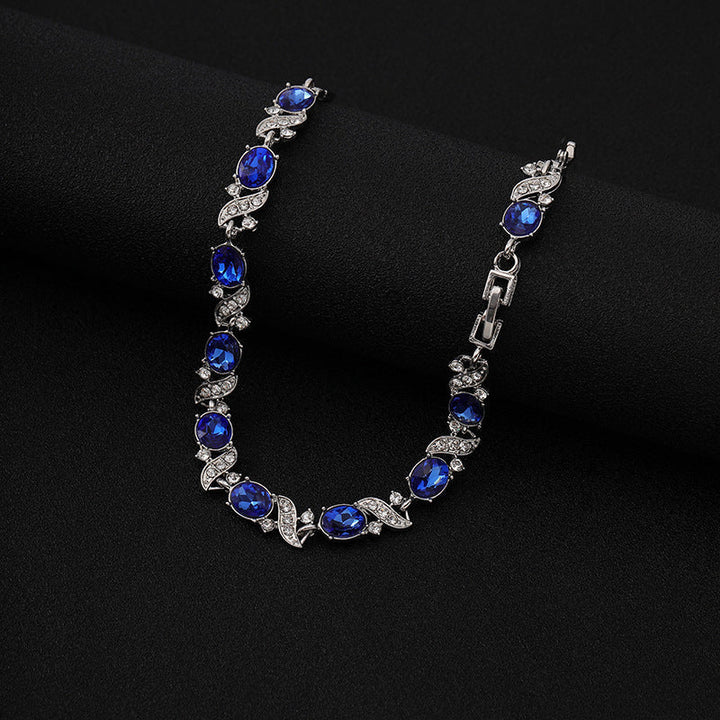 Sapphire Oval & Crystal Swirl Tennis Bracelet